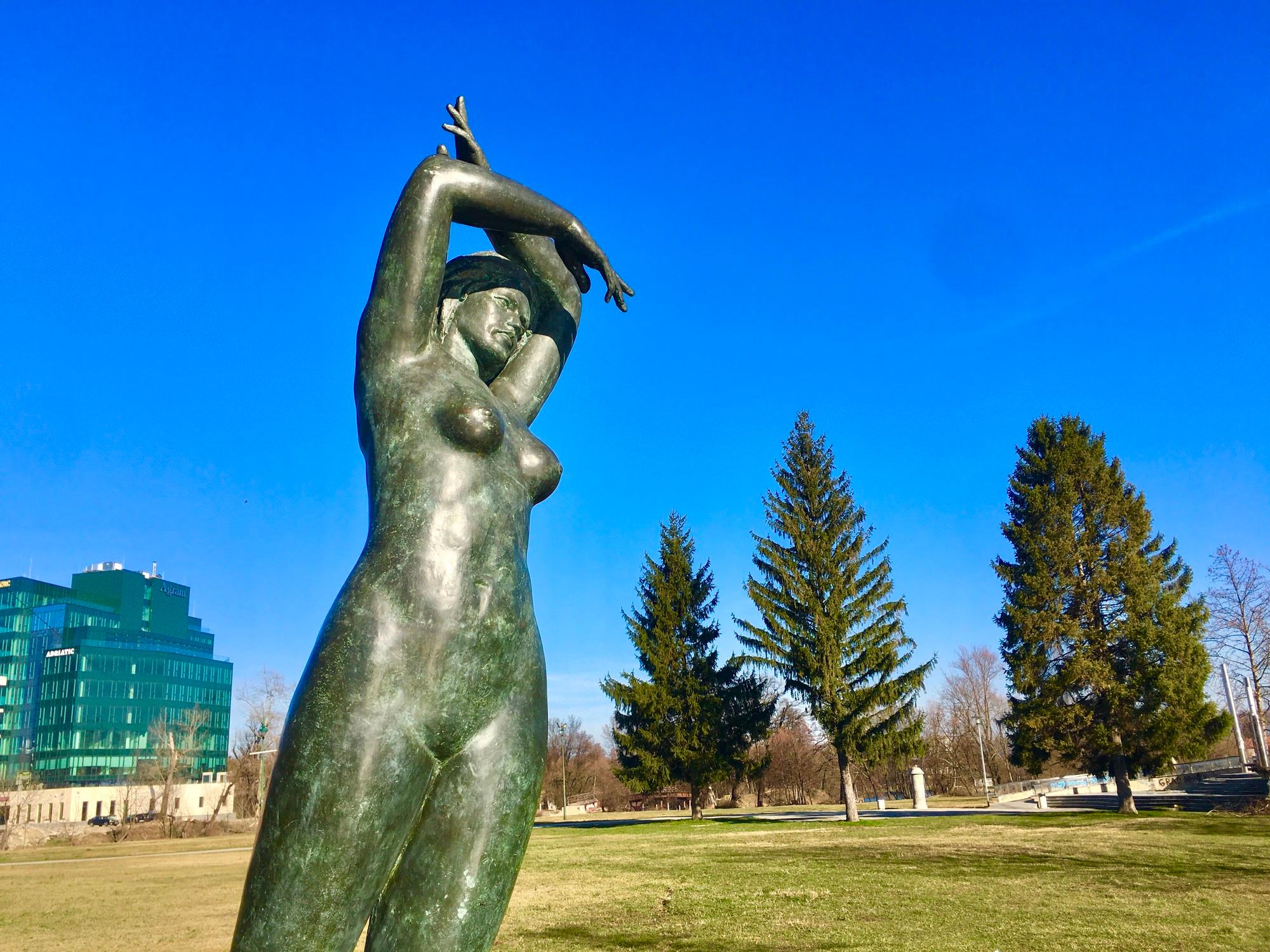 Girl With Una Statue